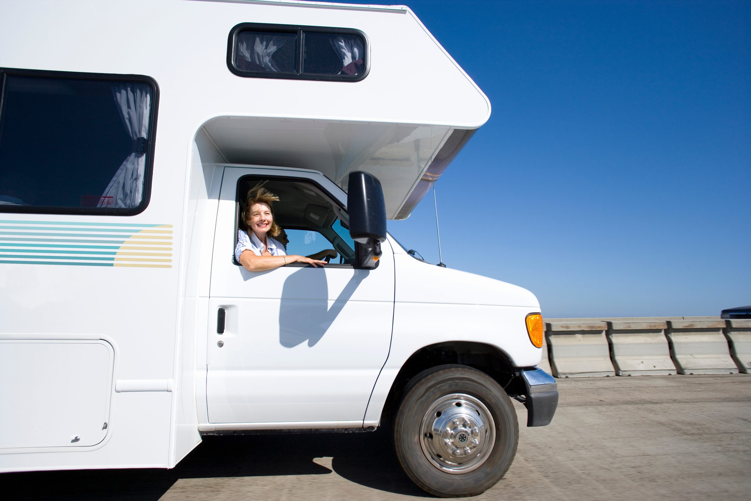 mature-woman-driving-motor-home-on-vacation-at-cam-2025-10-14-06-00-15-utc RV Adventure USA | California Rv Tours
